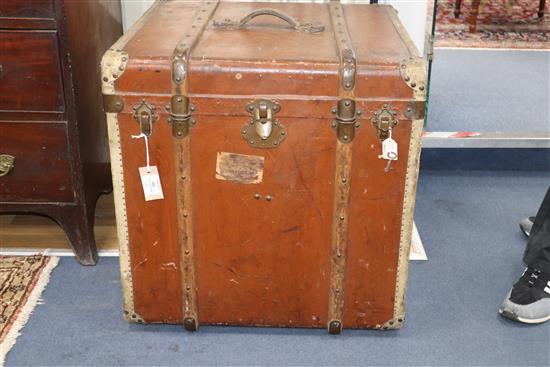 A Victorian leather covered wooden bound trunk W.60cm